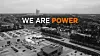 Forside bilde av Power butikk i svar og hvitt med tekst over 'WE ARE POWER' hvor ordet power oransje