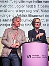 Claus Sonberg og Anette Trettebergstuen står ved en lilla talerstol med Nordiske mediedager-logo.